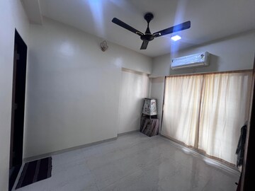 Room in 2 BHK Apartment at Pratham ARC Aura, Andheri West – for Rent