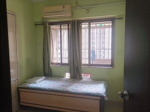 Bedroom in 2 BHK Apartment at Runwal Garden City, Balkum Pada – for Rent