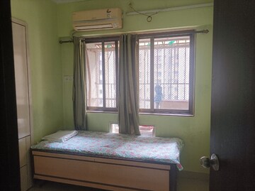 Bedroom in 2 BHK Apartment at Runwal Garden City, Balkum Pada – for Rent