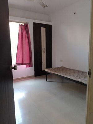 Bedroom in 2 BHK Apartment at Goel Ganga Cypress, Tathawade – for Rent