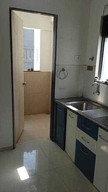 Kitchen in 3 BHK Apartment at Raj Heramb Regalia Residency, Bavdhan – for Rent