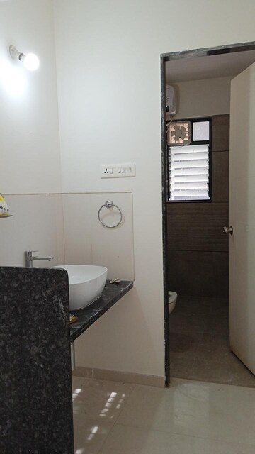 Bathroom in 3 BHK Apartment at Raj Heramb Regalia Residency, Bavdhan – for Rent