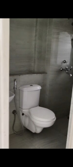 Bathroom in 1 BHK Apartment at Runwal Gardens, Dombivli East – for Rent