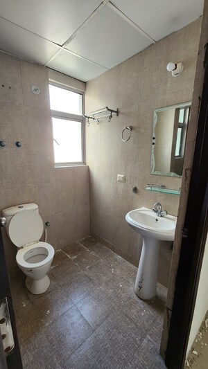 Bathroom in 1 BHK Apartment at Aditya Urban Homes, Shahpur Bamheta – for Rent