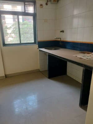 Kitchen in 1 BHK Apartment at Puranik City, Kasarvadavali – for Sale