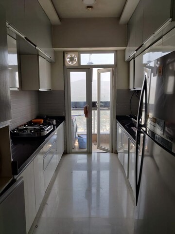 Kitchen in 3 BHK Apartment at Omkar Alta Monte, Malad East – for Sale