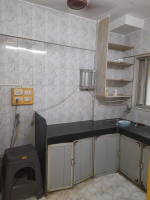 Kitchen in 1 BHK Apartment at Harsiddh Park CHS, Vasant Vihar – for Rent