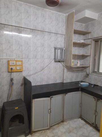 Kitchen in 1 BHK Apartment at Harsiddh Park CHS, Vasant Vihar – for Rent
