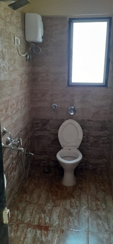 Bathroom in 2 BHK Apartment at Swapnapurtii CHS, Poonam Nagar – for Rent