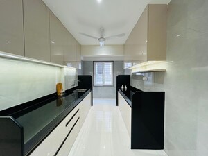 Kitchen in 2 BHK Apartment at Sun City, Sinhagad Road – for Sale