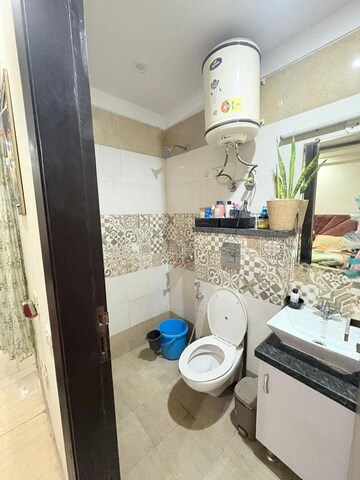 Bathroom in 1 RK Builder Floor at Chattarpur – for Rent