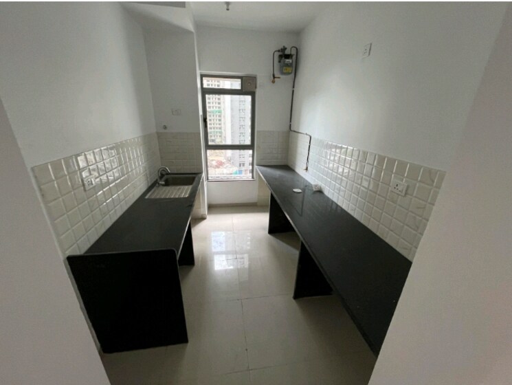 Kitchen, kalpataru-immensa-d 2 Bedroom 664 Sq.Ft. Apartment In Kolshet Road Thane 9550773
