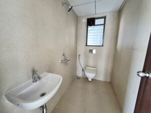 Bathroom in 1 BHK Apartment at Runwal My City Phase II Cluster 05, Dombivli East – for Rent