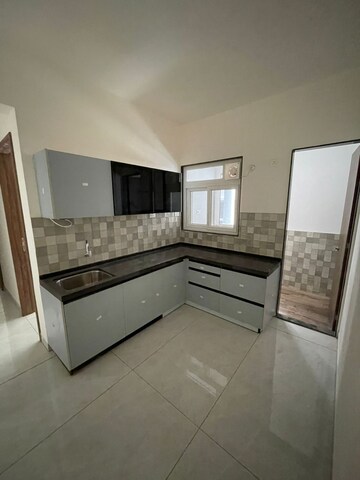 Kitchen in 2 BHK Apartment at D And T Mountain View CHS, Senapati Bapat Road – for Rent