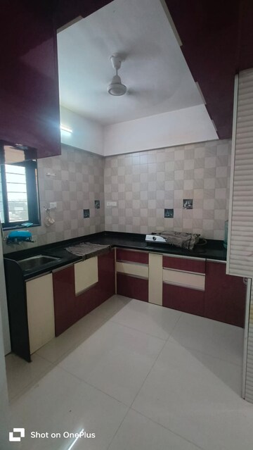 Kitchen in 2 BHK Apartment at Wadgaon Sheri – for Rent