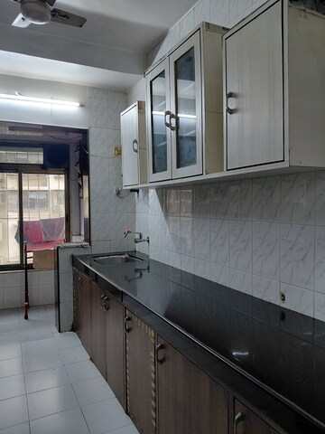 Kitchen in 2 BHK Apartment at HDIL Dheeraj Jamuna, Malad West – for Rent