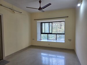 Room in 2 BHK Apartment at Lokhandwala Whispering Palms, Kandivali East – for Sale