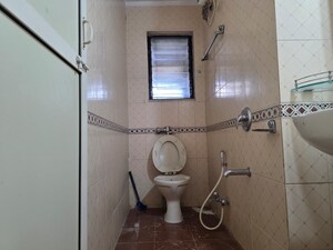Bathroom in 2 BHK Apartment at Lokhandwala Whispering Palms, Kandivali East – for Sale
