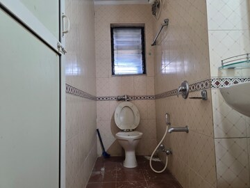 Bathroom in 2 BHK Apartment at Lokhandwala Whispering Palms, Kandivali East – for Sale