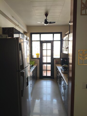 Kitchen in 3 BHK Apartment at Golden Sand Apartments, Dhakoli – for Sale