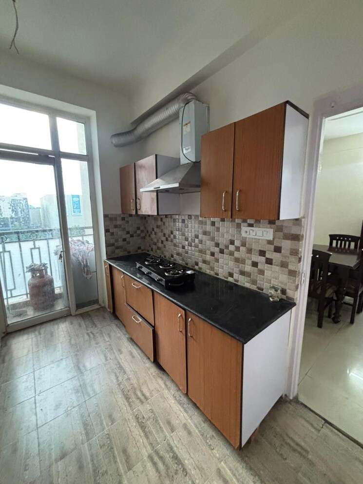 Kitchen, ansal-api-celebrity-gardens 2 Bedroom 1295 Sq.Ft. Apartment In Sushant Golf City Lucknow 9551077