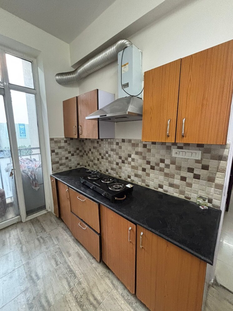 Kitchen, ansal-api-celebrity-gardens 2 Bedroom 1295 Sq.Ft. Apartment In Sushant Golf City Lucknow 9551077