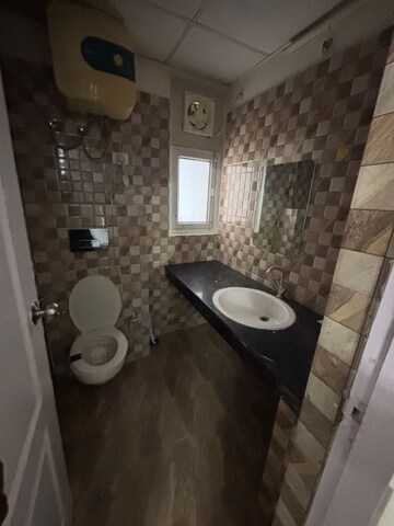 Bathroom in 2 BHK Apartment at Ansal API Celebrity Gardens, Sushant Golf City – for Rent