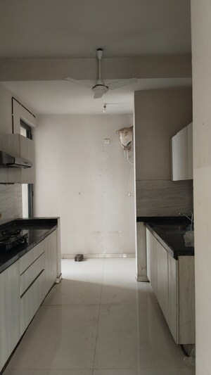 Kitchen in 4 BHK Apartment at Rustomjee Seasons, Bandra East – for Sale