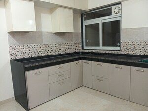 Kitchen in 2 BHK Apartment at Mahavir Square, Manpada – for Rent