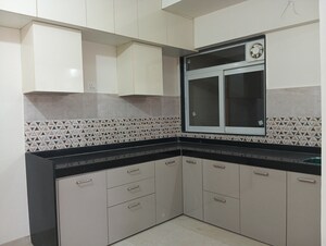 Kitchen in 2 BHK Apartment at Mahavir Square, Manpada – for Rent