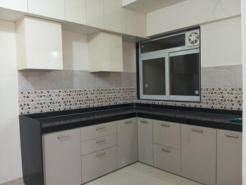 Kitchen in 2 BHK Apartment at Mahavir Square, Manpada – for Rent