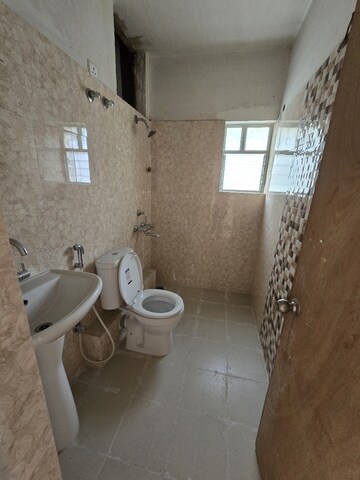 Bathroom in 3 BHK Apartment at Bengal Teen Kanya, Rajarhat New Town – for Sale