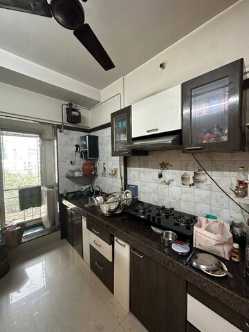 Kitchen in 2 BHK Apartment at Hiranandani Estate, Ghodbunder Road – for Rent