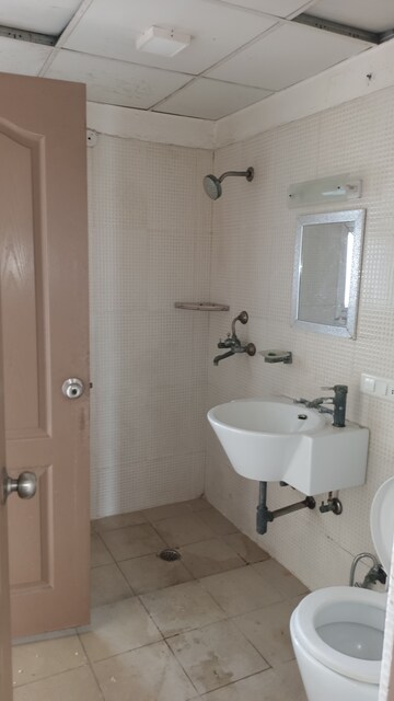 Bathroom in 3 BHK Apartment at Aditya Celebrity Homes, Sector 76 – for Rent