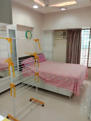 Bedroom in 2 BHK Apartment at Raheja Sherwood, Goregaon East – for Rent