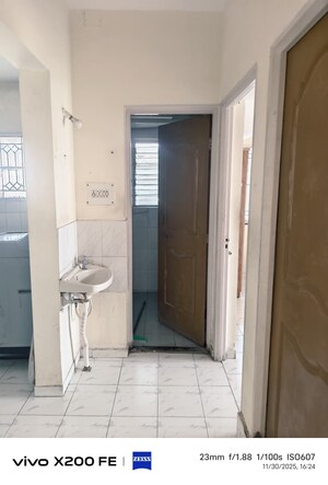 Bathroom in 1 BHK Apartment at Naiknavare Gardenia Society Phase 1, Wadgaon Sheri – for Rent