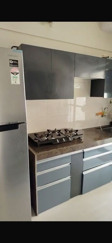 Kitchen in 2 BHK Apartment at Cosmopolis Tower, Andheri West – for Rent