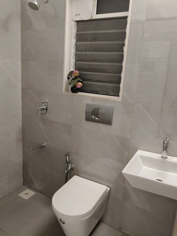 Bathroom in 1 BHK Apartment at Dosti West County, Balkum Pada – for Sale