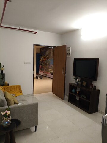 Living Room in 1 BHK Apartment at Dosti West County, Balkum Pada – for Sale