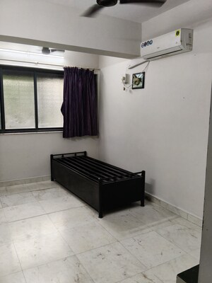 Living Room in 1 BHK Apartment at Pratap CHS, Santacruz East – for Rent