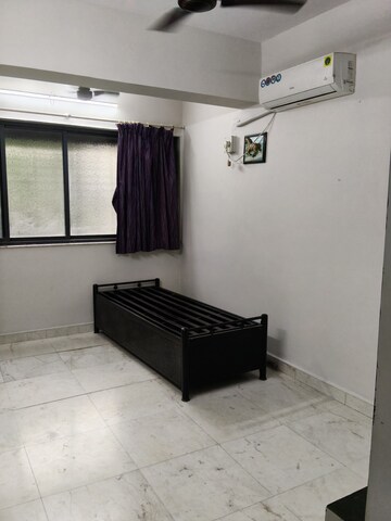 Living Room in 1 BHK Apartment at Pratap CHS, Santacruz East – for Rent