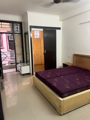 Bedroom in 1.5 BHK Builder Floor at South Extension I – for Rent