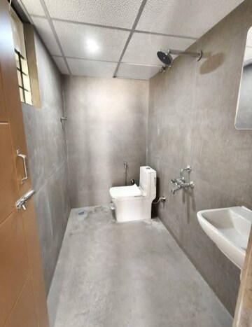 Bathroom in 2 BHK Builder Floor at Dwaraka Apartments Indiranagar, Indiranagar – for Rent