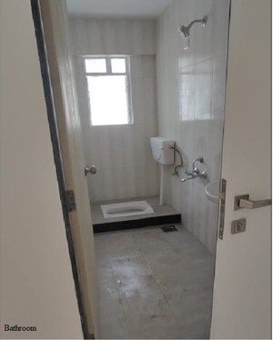 Bathroom in 1 BHK Apartment at Gera Shrishti, Wagholi – for Rent