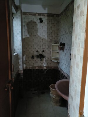 Bathroom in 3 BHK Apartment at Vasundhara Enclave – for Sale