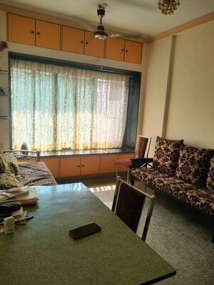 Living Room in 2 BHK Apartment at Vrindavan ABC CHS, Malad East – for Rent
