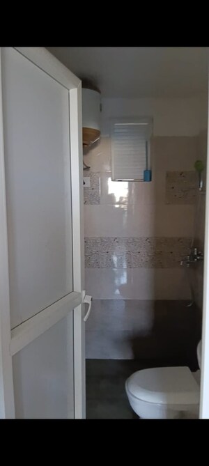 Bathroom in 2 BHK Apartment at Windlass River Valley, Harrawala – for Rent