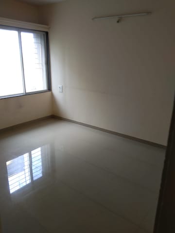 Bedroom in 2.5 BHK Apartment at Associated Sai Smruti, Dahanukar Colony – for Rent