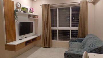 Living Room in 2 BHK Apartment at Lodha Amara, Kolshet Road – for Sale