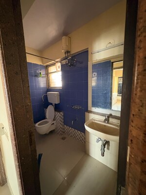 Bathroom in 2 BHK Apartment at Kanakia Spaces Niharika, Manpada – for Rent
